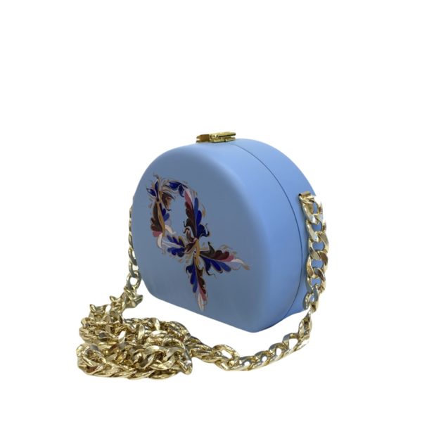light blue round wooden handbag